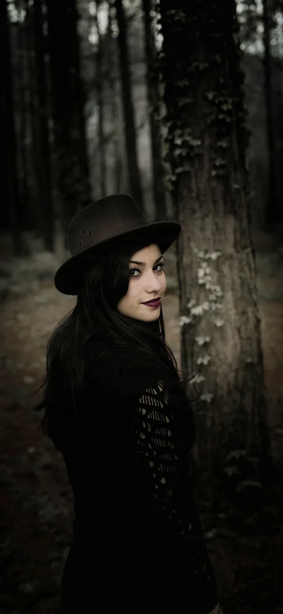 The same portrait as a tall phone wallpaper, with forest added above and below