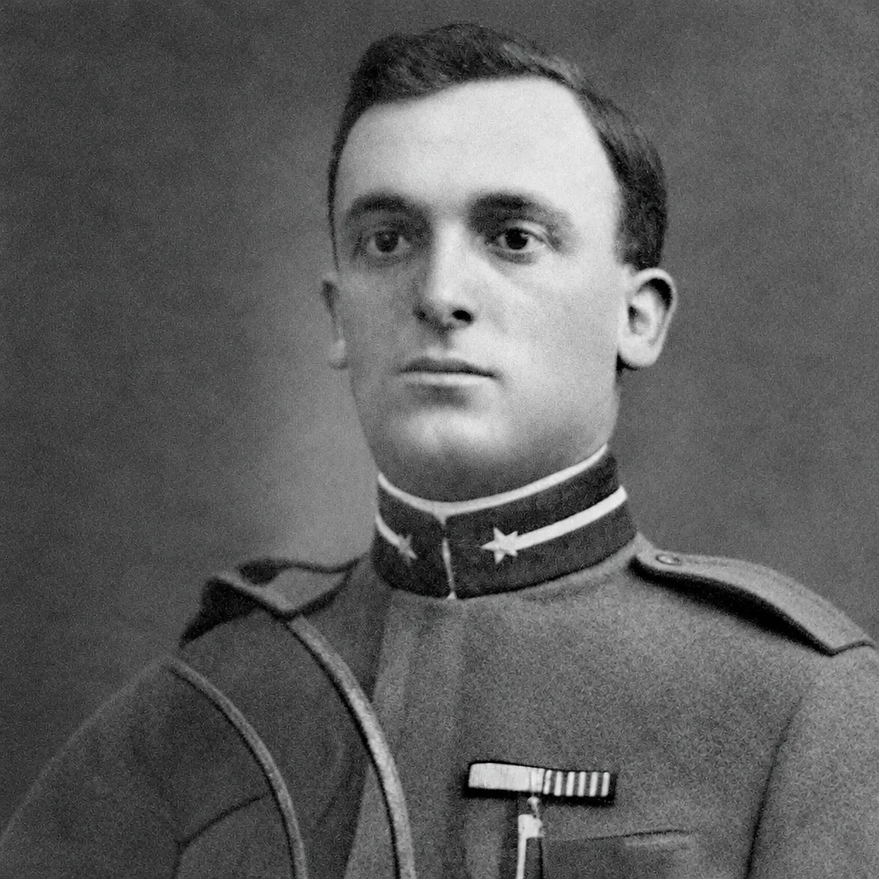 The same soldier with the crease, spots and corner repaired, still grey